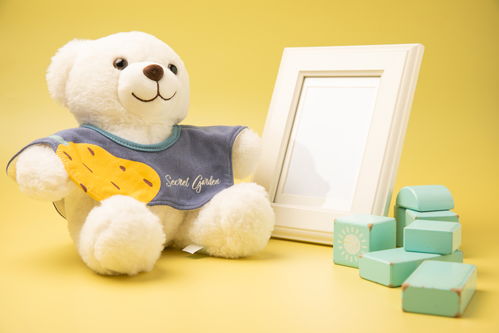 黃色可愛兒童玩偶玩具母嬰用品攝影圖 st攝影